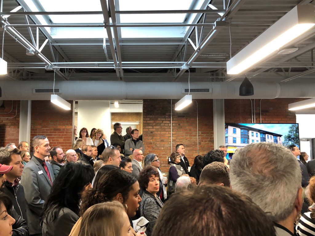 Crowds at TReC by NGTI ribbon cutting.