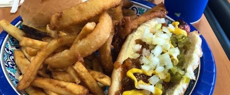 Photo of Jim’s Super Plate: hot dog, burger, onion rings, fries, and Pepsi product