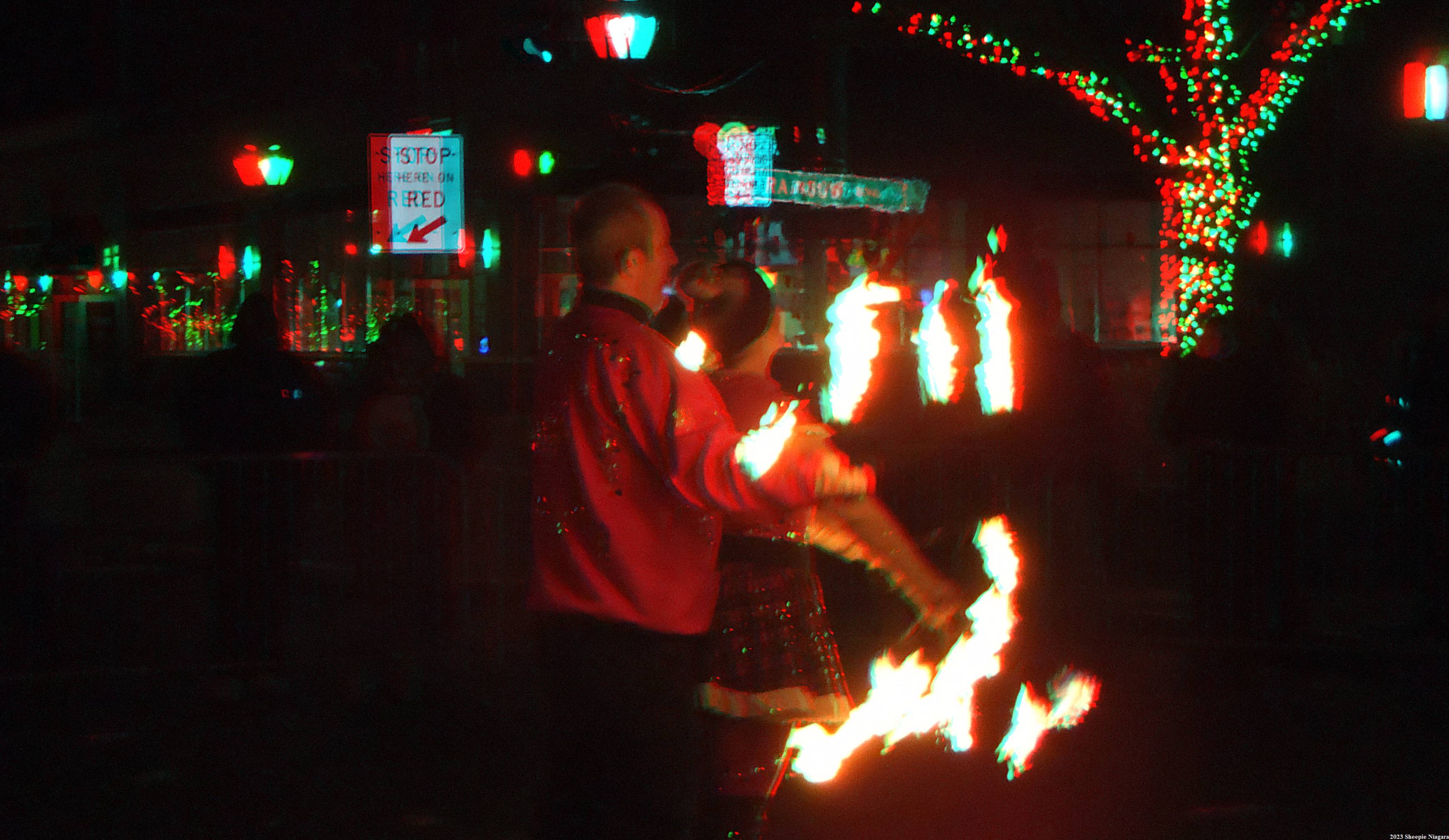 Anaglyph 3D view of a fire dance performance on Old Falls Street, Niagara Falls, NY